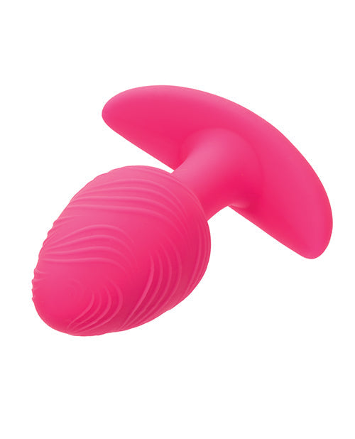 Plug anal vibrant lumineux dans le noir Cheeky Glow - Rose