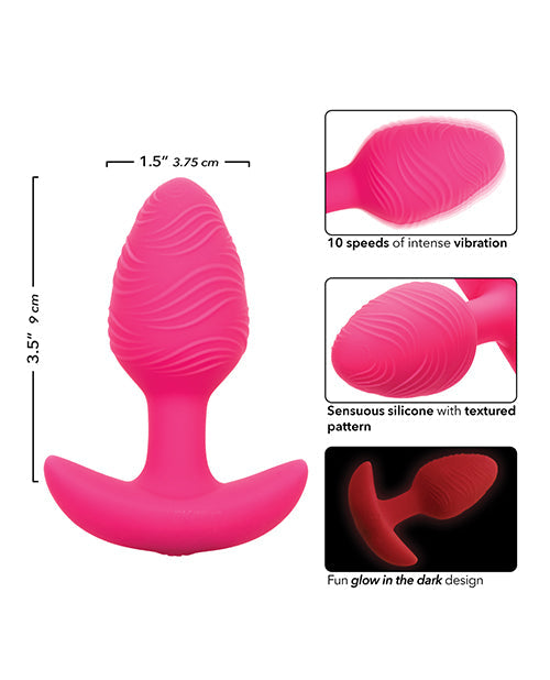 Plug anal vibrant lumineux dans le noir Cheeky Glow - Rose